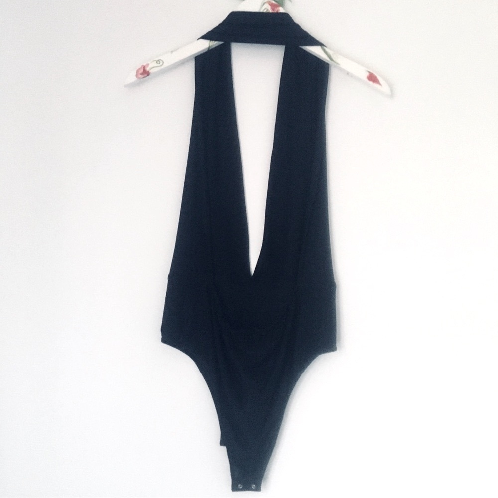 NWOT Tobi black, halter, low V bodysuit size M